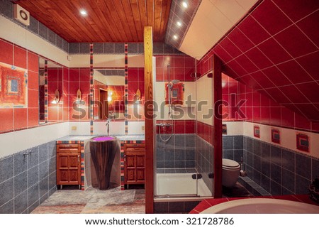 Image of spacious new style colorful bathroom interior