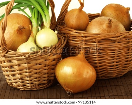 Two baskets filled with onions