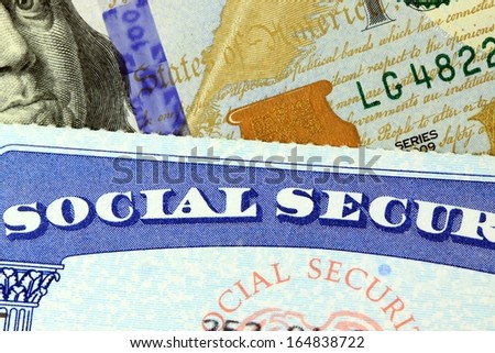 Social security card and US currency