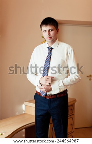 men wear a shirt and cufflinks