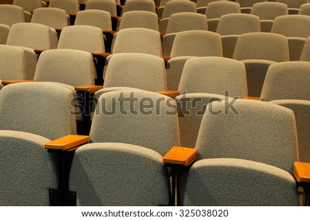 rows of chairs in auditorium