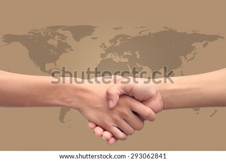 handshake of success congratulation greeting dealing with world map background. design with space for adding text.