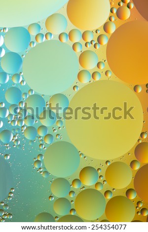 Silver, blue, orange and gold oil and water abstract