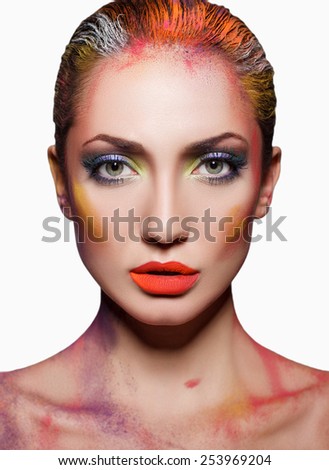 Beautiful girl bright make-up on a white background