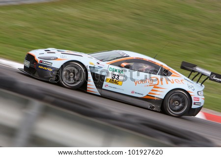 ZANDVOORT, THE NETHERLANDS - MAY 6: Christoffer Nygaard and Kristian Poulsen in the Young Driver AMR Aston Martin V12 Vantage racing on May 6, 2012 in the ADAC GT Masters in Zandvoort, The Netherlands