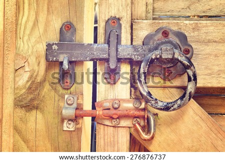 Double-lock on a garden gate. Retro-style