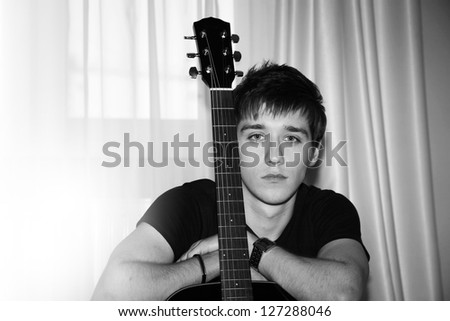 portrait of a man with guitar