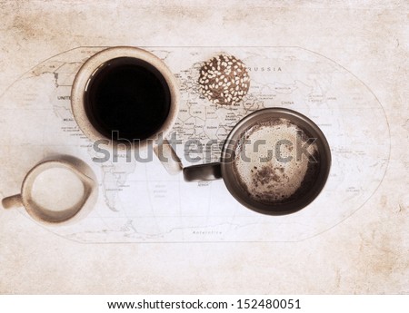 artwork  in grunge style,  two cups of coffee, world political map, milk jug and cookie