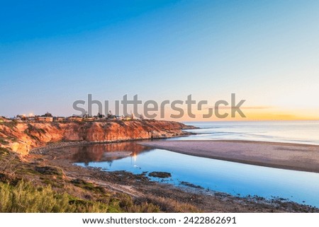 Similar – Image, Stock Photo Picturesque scenery of coastal town surrounded by sea