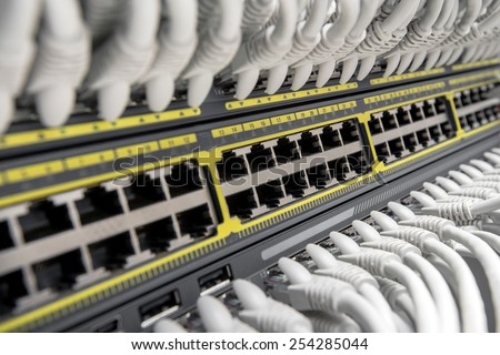Network Gigabit Smart Switch with network cables installed in the rack