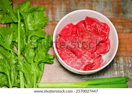 Image, Stock Photo Two hands put leaves into a fast foaming flowing river.