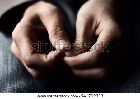 Hands Placed Anxiously in Lap Stock foto © 
