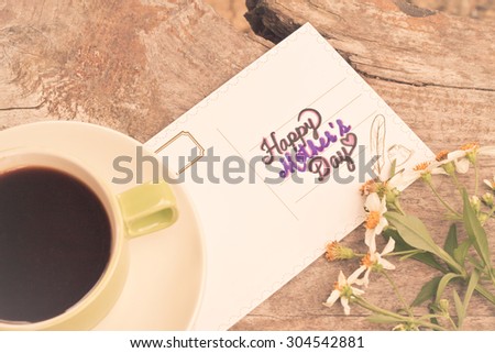Mother\'s Day card written on an old wooden concept of Mother\'s Day.