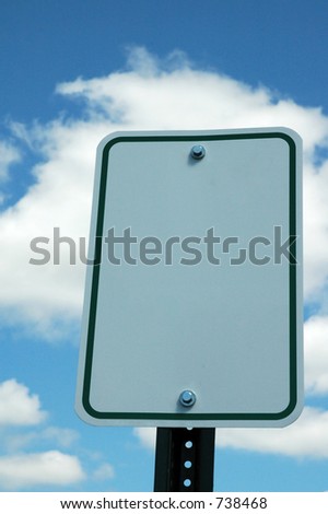 Blank Sky against a brilliant blue sky with puffy white clouds.  Ready for you to add the text of your choosing.