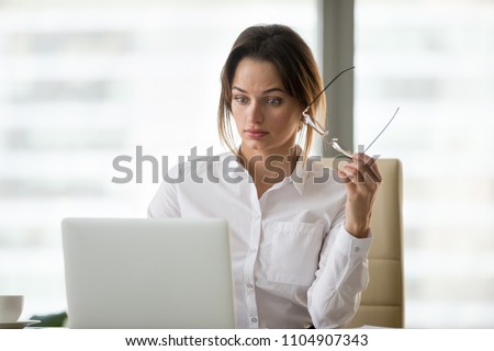 Shocked surprised businesswoman amazed by reading unbelievable online breaking news on laptop, astonished woman feels stunned dumbfounded looking at computer screen baffled by unexpected email letter Stock foto © 