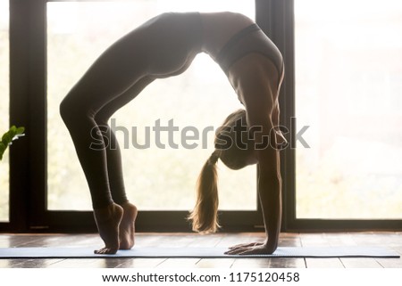 Similar – Foto Bild urdhva dhanurasana.foto des Mädchens beim Yoga am Pool in einem Ferienort