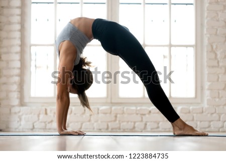 Similar – Foto Bild urdhva dhanurasana.foto des Mädchens beim Yoga am Pool in einem Ferienort