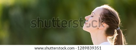 Similar – Image, Stock Photo Woman walking in green meadow near lighthouse