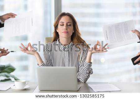 Similar – Image, Stock Photo Group of calm focused women and men practicing yoga with trainer standing in balance pose and stretching body in studio