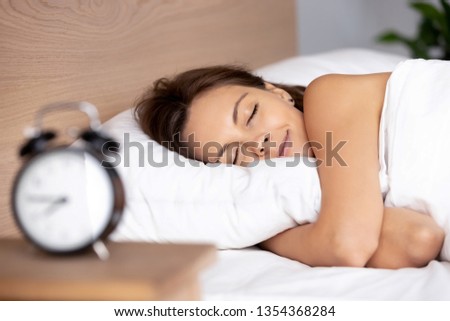 Similar – Image, Stock Photo Woman dozing in bed after breakfast