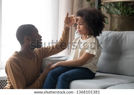 Similar – Image, Stock Photo Serious vaccinated girl with band aid on arm