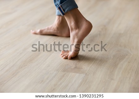 Similar – Image, Stock Photo Crop barefoot woman walking along seaside