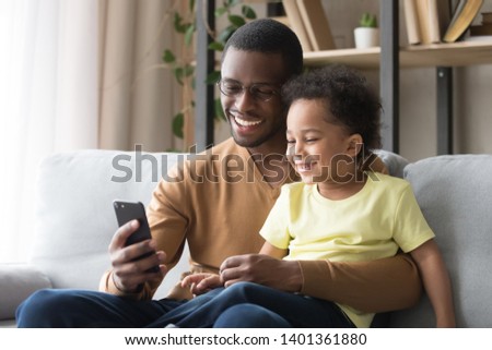 Similar – Image, Stock Photo photo of man playing classical guitar