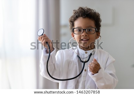 Similar – Image, Stock Photo smiling boy dressed as Joker on dark background