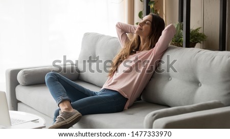 Similar – Image, Stock Photo young woman stretching leaning in a amazing geometrical building