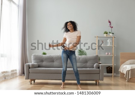 Similar – Image, Stock Photo Excited black woman having fun in park