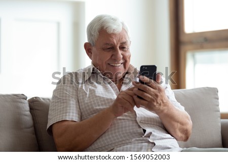 Similar – Image, Stock Photo Senior man using medical device to measure blood pressure