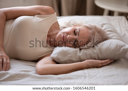 Similar – Image, Stock Photo Woman dozing in bed after breakfast