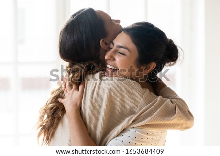 Similar – Image, Stock Photo two friends or sisters taking a picture outdoors with mobile phone over yellow background. technology and lifestyle concept