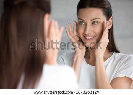 Similar – Image, Stock Photo Smiling woman in spot of light