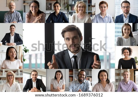 Headshot screen application view of smiling multiracial employees talk speak on video call brainstorm together, multiethnic coworkers engaged in team discussion online using Web conference