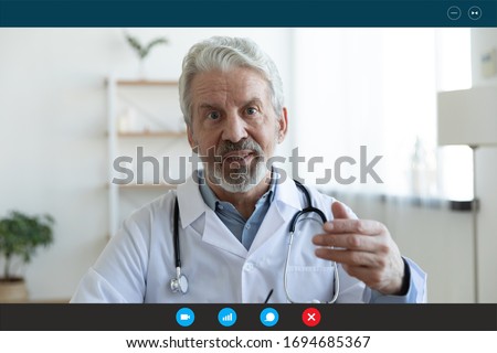 Similar – Image, Stock Photo Senior physician working on laptop in hospital