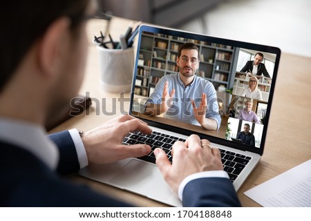 Businessman boss leader leads distant communication diverse businesspeople involved in group videocall conversation discuss common project, partners negotiating. Modern technology and business concept