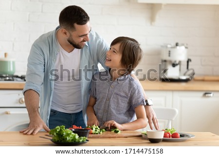 Similar – Image, Stock Photo Father explains nature to child