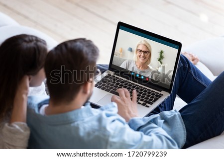 Image, Stock Photo Couple having video call sending greetings from vacation trip. Hikers with backpacks on way to mountains. People walking through tall grass along path in meadow on sunny day