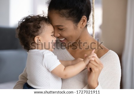 Similar – Image, Stock Photo Happy ethnic mother taking selfie with kid