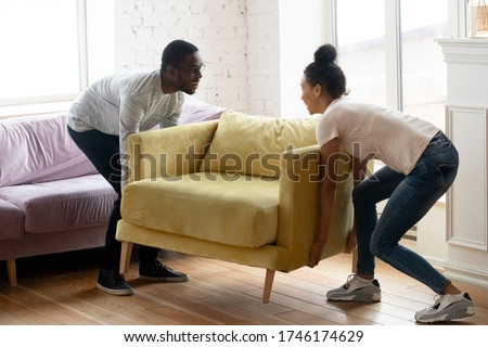 Similar – Image, Stock Photo Afro woman repairing furniture at home.