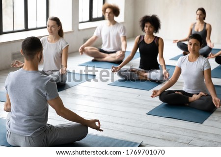 Similar – Image, Stock Photo Strong ethnic sportsman breathing during training on sports ground