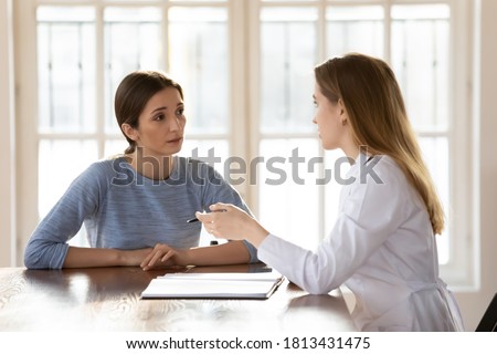 Similar – Image, Stock Photo Professional psychologist doctor giving the consult to female patient