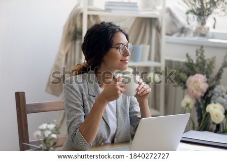 Similar – Image, Stock Photo Dreamy young lady drinking hot beverage near window with adorable weiro bird on shoulder