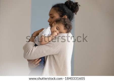 Similar – Image, Stock Photo toddler carries an armful of plucked carrots in the garden. Sunny summer happy day. Harvesting in the fall