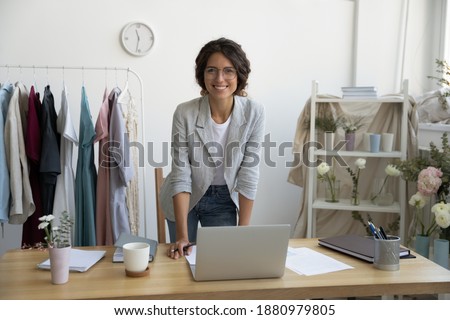 Similar – Image, Stock Photo Female designer creating floral bouquets in studio