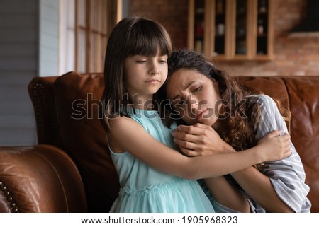 Similar – Image, Stock Photo Tender mother embracing sad son