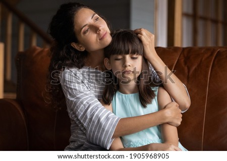 Image, Stock Photo Tender mother embracing sad son