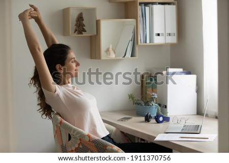 Similar – Image, Stock Photo young woman stretching leaning in a amazing geometrical building