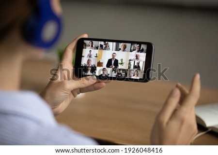 Similar – Image, Stock Photo Businesswoman having smartphone conversation near gray wall